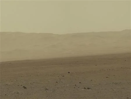 This color image taken August 8, 2012 from NASA’s Curiosity rover shows part of the wall of Gale Crater