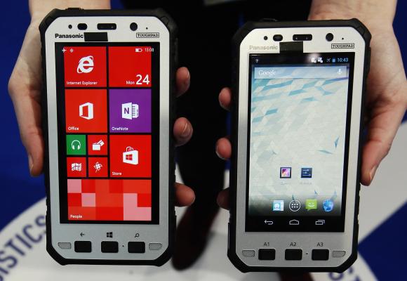 Japanese electornic supplier Panasonic’s new Toughpad handsets are displayed at the company’s stand at the Mobile World Congress in Barcelona