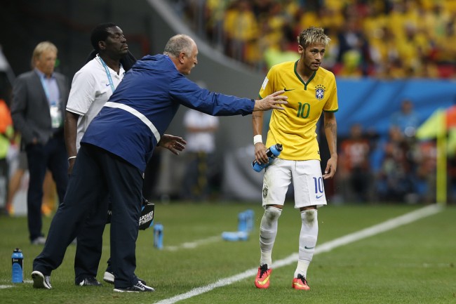 Zdjęcie BRASILIA, BRAZIL – June 23, 2014: Coach Luiz Felipe Scolari of Brazil and Neymar during the 2014 World Cup game between Brazil and Cameroon at Estadio Nacional Mane Garrincha. No Use in Brazil. pochodzi z serwisu ShutterStock