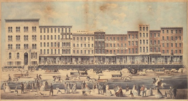 1024px-Street_Raising_on_Lake_Street