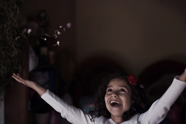 A candid of my little cousin in her happiest state (flowers are not edited)