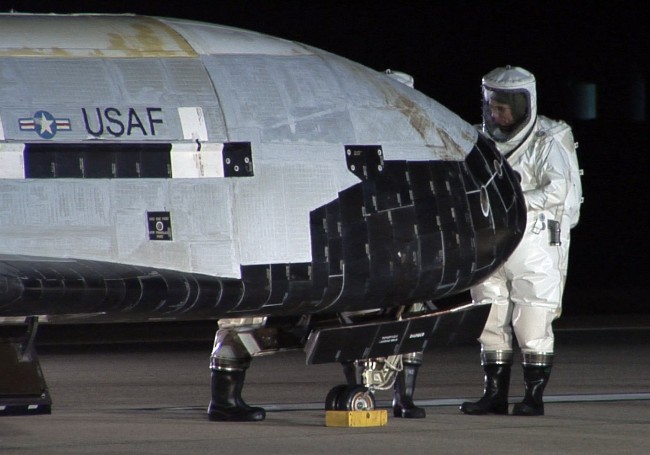 The_X-37B_OTV_is_inspected_after_landing_at_Vandenberg_Air_Force_Base,_California