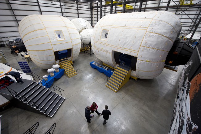 NASA Deputy Administrator Lori Garver is given a tour of the Bigelow Aerospace facilities by the company's President Robert Bigelow on Friday, Feb. 4, 2011, in Las Vegas.  NASA has been discussing potential partnership opportunities with Bigelow for its inflatable habitat technologies as part of NASA's goal to develop innovative technologies to ensure that the U.S. remains competitive in future space endeavors. Photo Credit: (NASA/Bill Ingalls) class="wp-image-401458" 