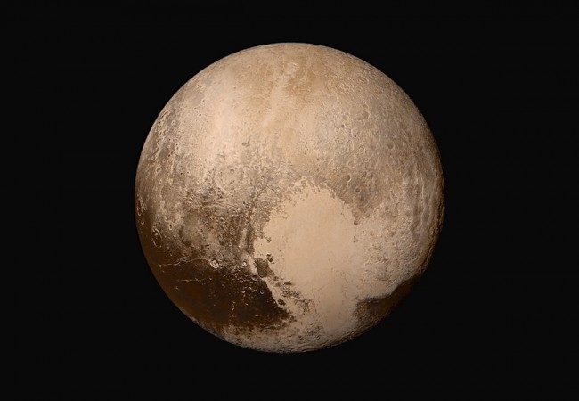 global-mosaic-of-pluto-in-true-color class="wp-image-427363" 