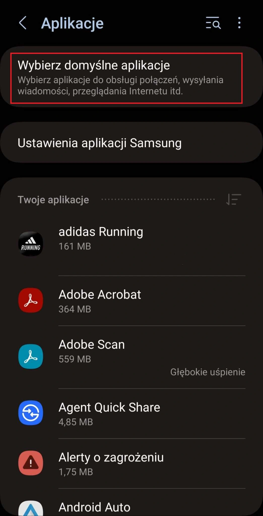W sekcji "Aplikacje" znajdź opcję "Domyślne aplikacje"