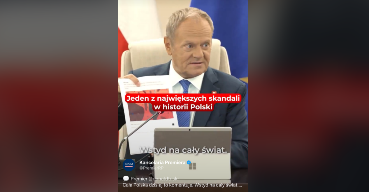Premier Polski macha kartką. Widać na niej biedę